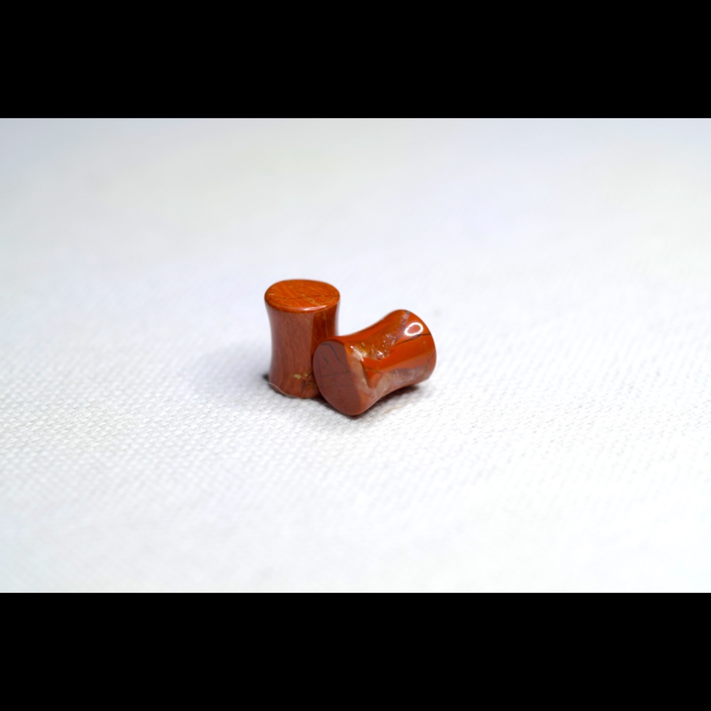 Carnelian stone flare plugs